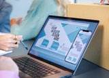 Side shot of laptop with website builder