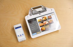 Image of a POS system comprised of a terminal and a card reader